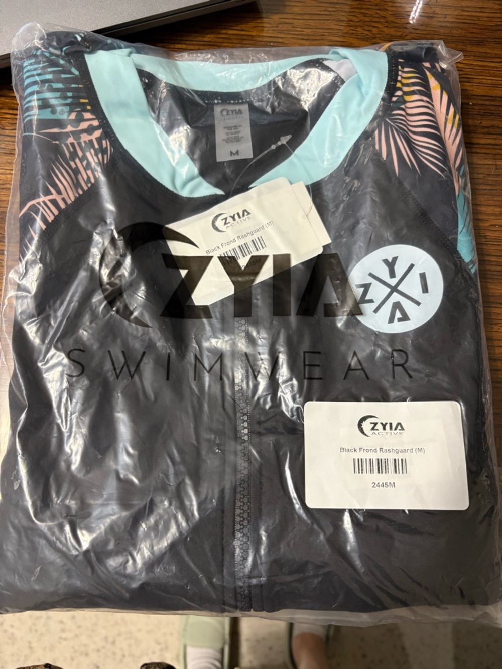 ZYIA Active Black Front Zip Rashguard with Mint and Coral Accents